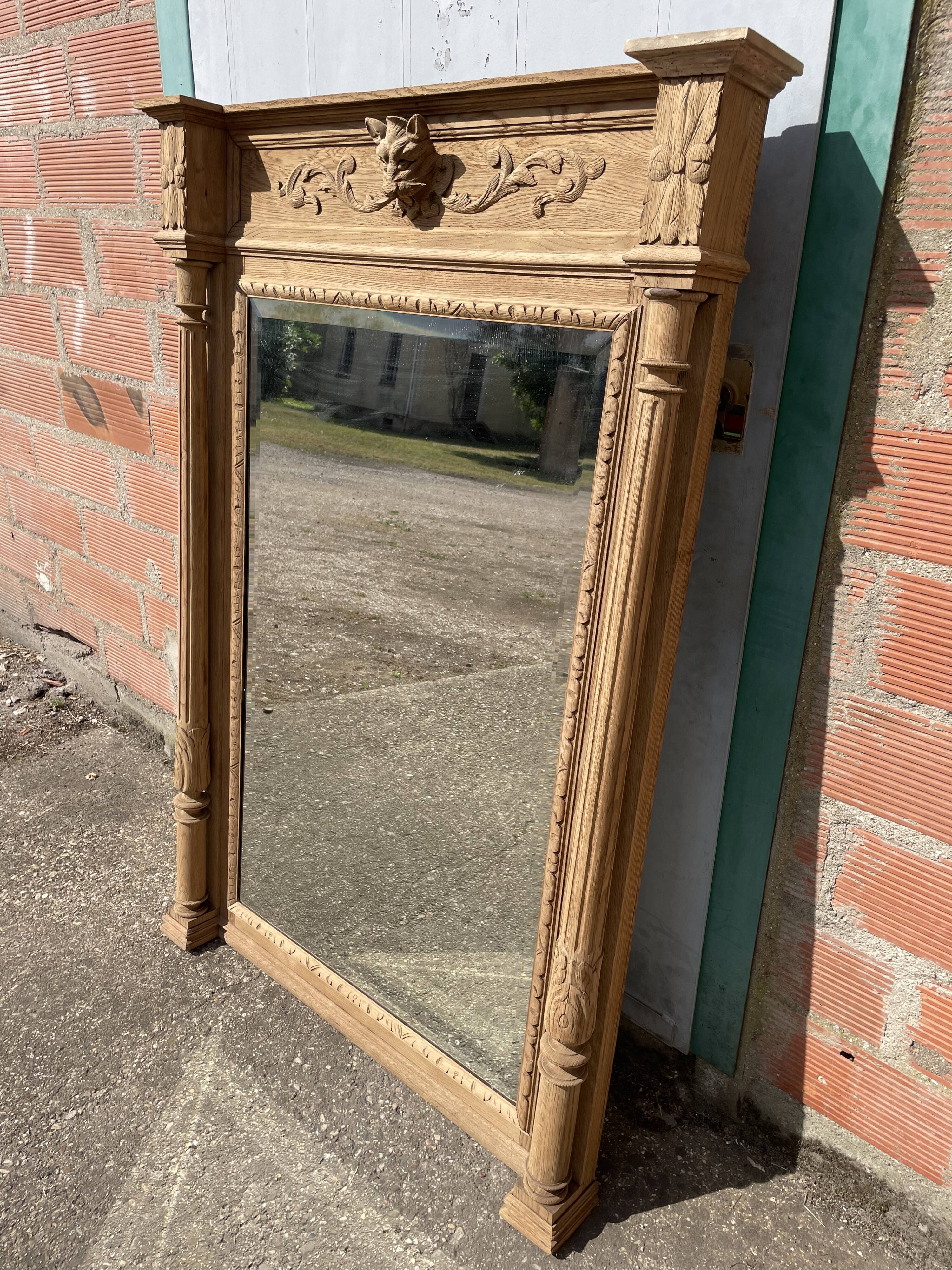 Mirror in oak aero erased wolf's head Henri II