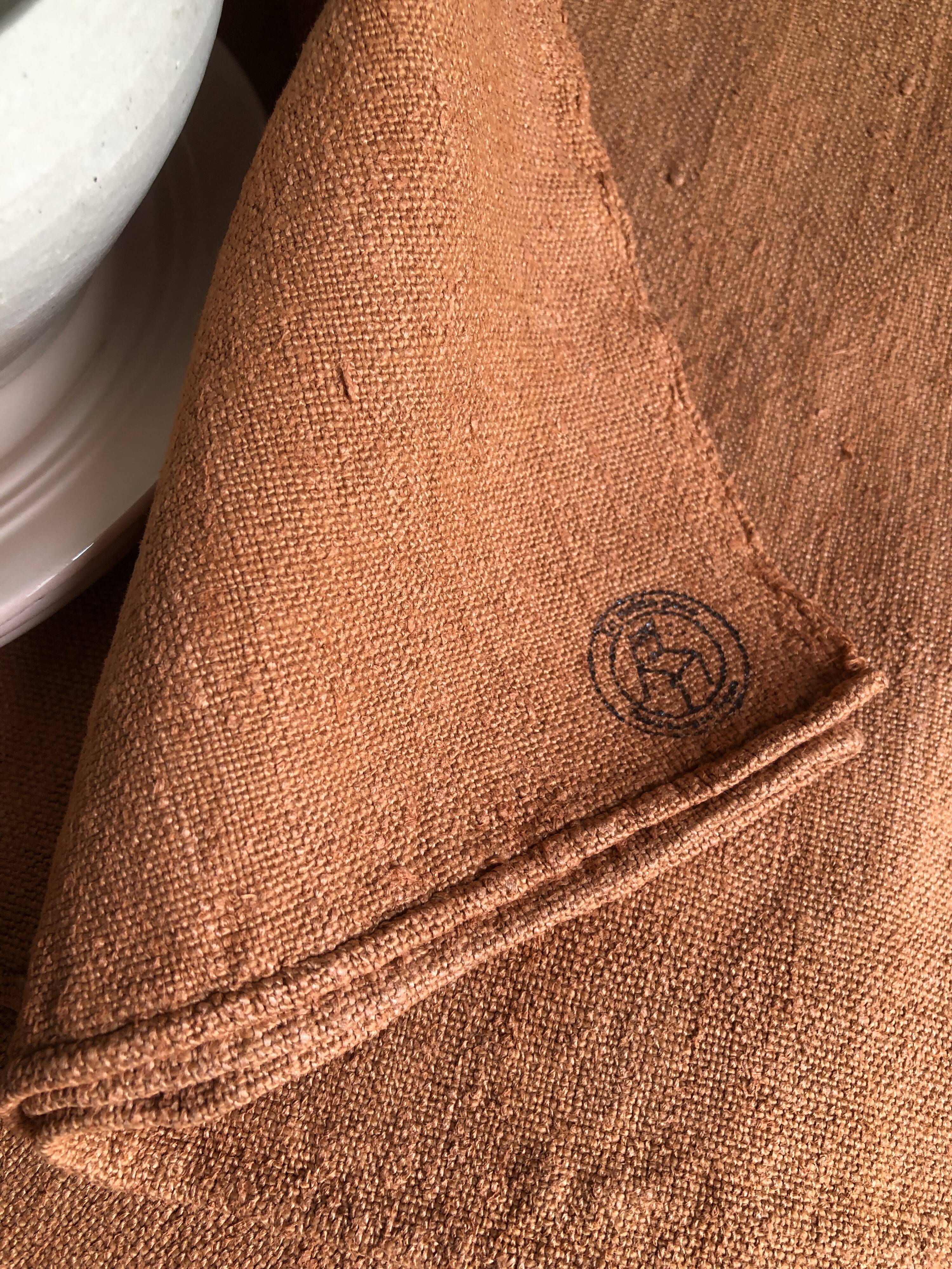 Old harvest tablecloth in terracotta tinted hemp