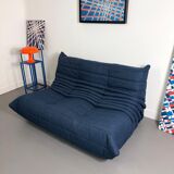 Two-seater sofa reupholstered.