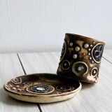 Tasse à café et soucoupe en céramique rustique