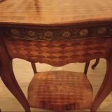 Pair of Louis XV style bedside tables with marquetry and bronze.