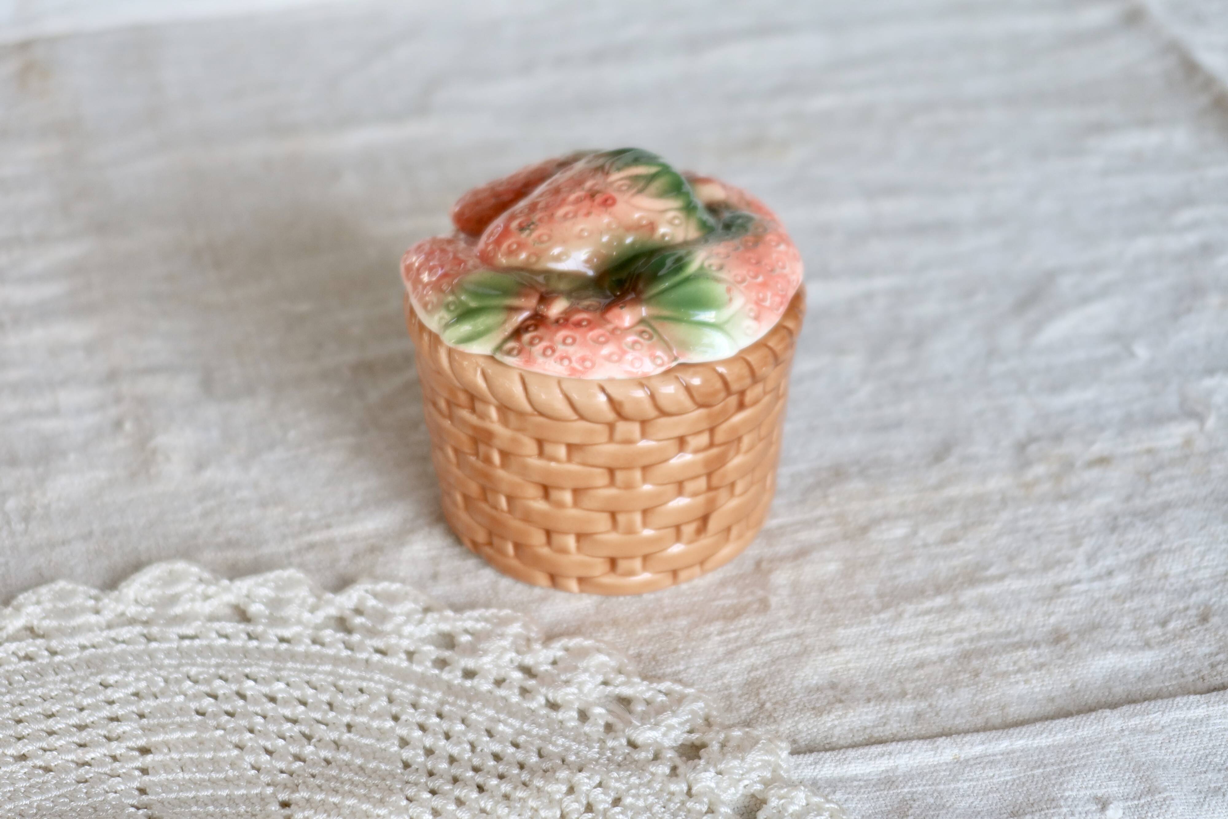 Small vintage ceramic sugar bowl with strawberry motif