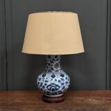 Blue and white porcelain lamp from China, 20th century, on wooden stand