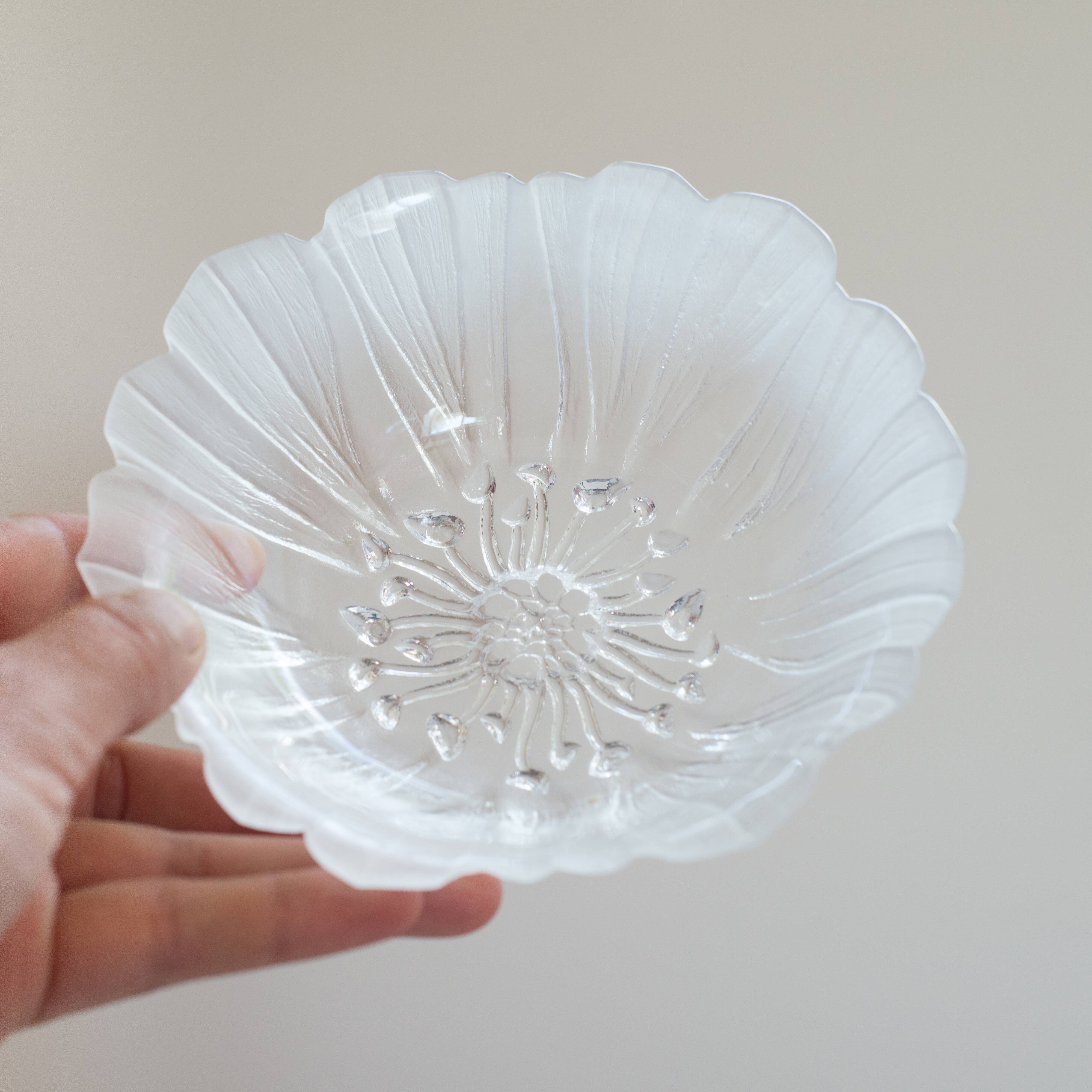 Cup or empty glass flower pocket