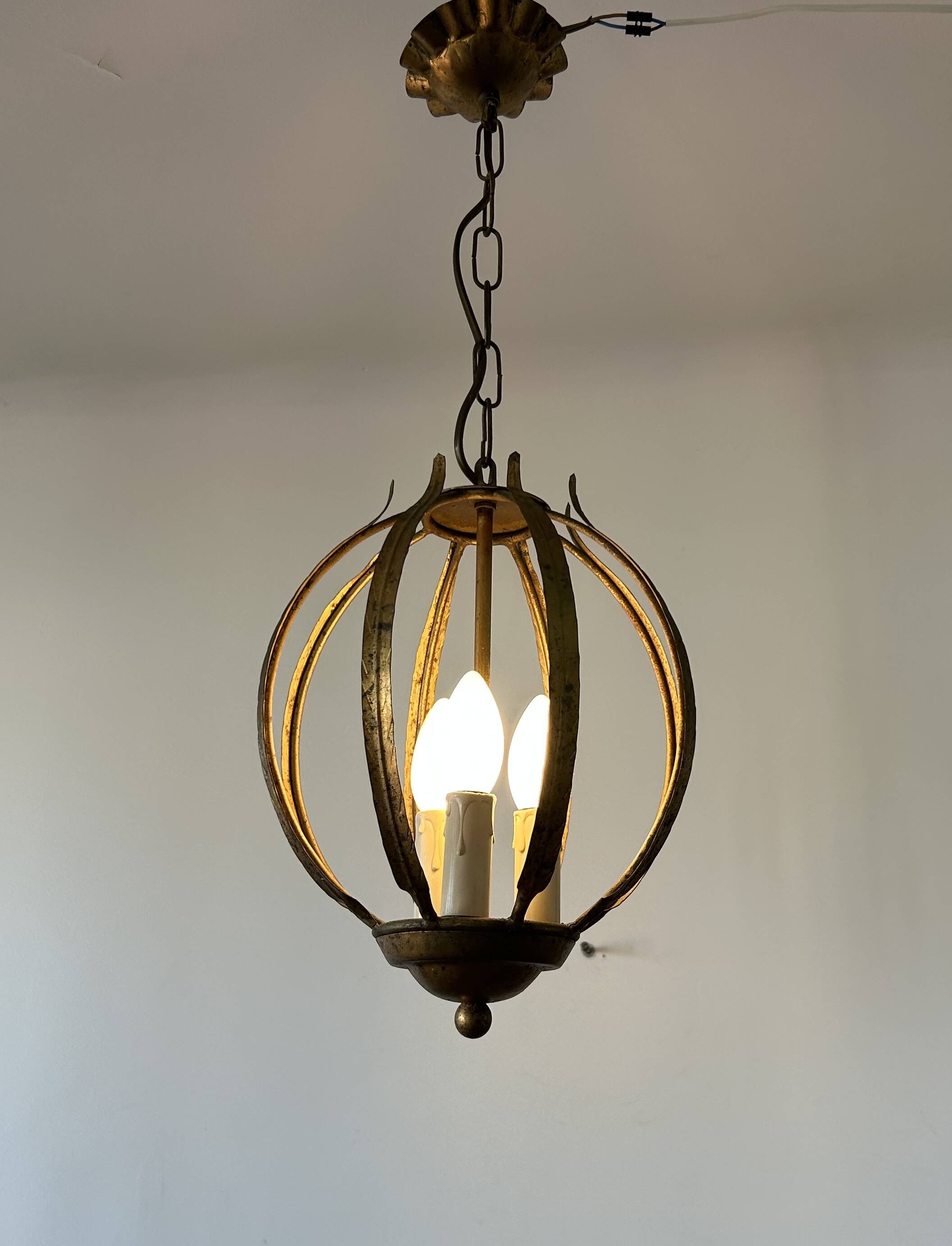 Chandelier, antique gold metal suspension.