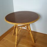 Round coffee table in wicker and bamboo