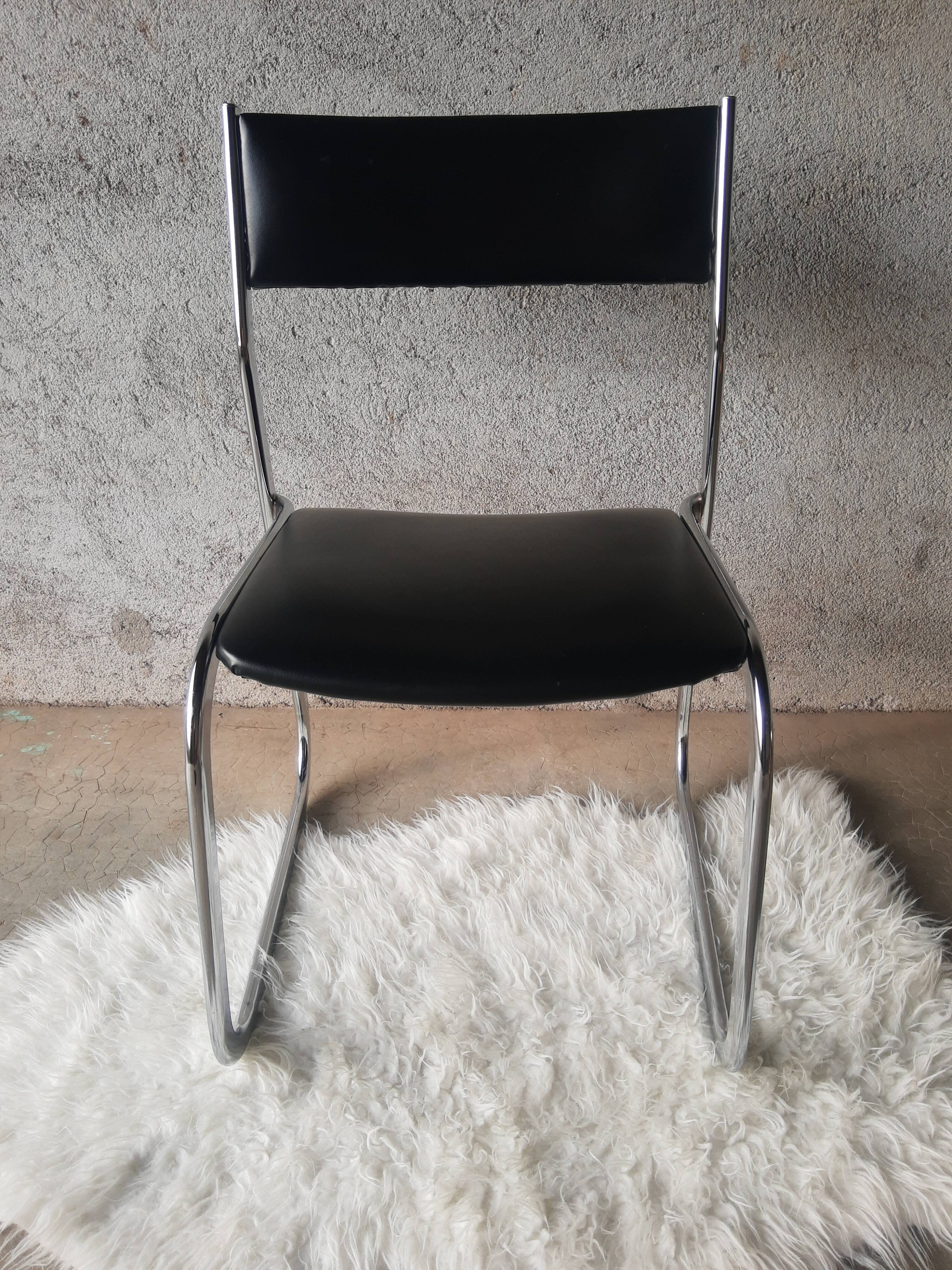 Vintage 70s black skai sled chair