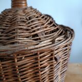 Dame Jeanne in her wicker and rattan clothing