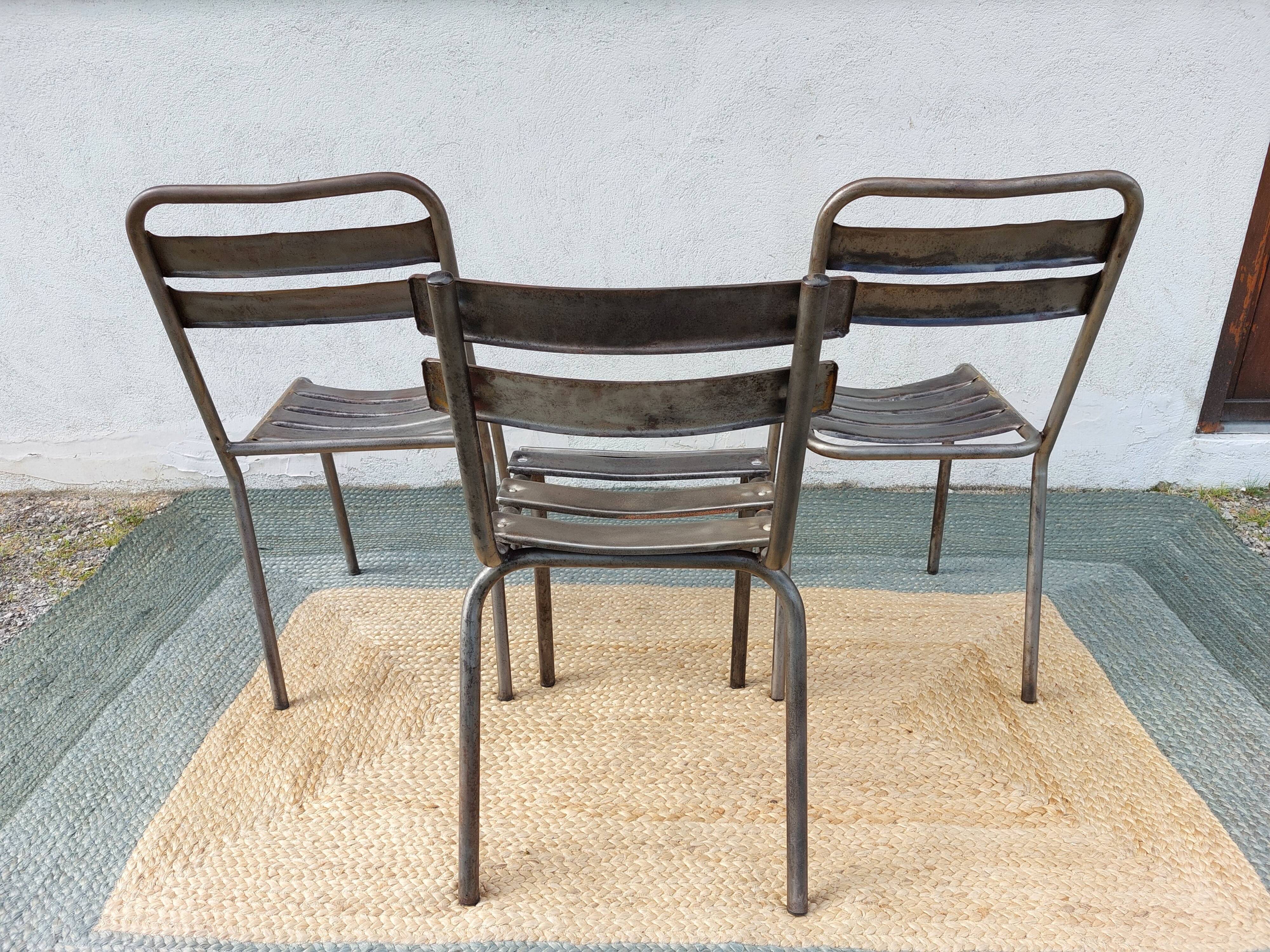 3 metal chairs, Tolix style