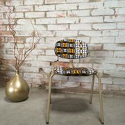 Vintage ethnic strafor tubular chair revisited with wax