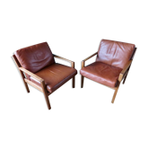 Pair of oak faults with tawny leather cushion. Denmark 1960