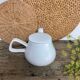 Vintage white teapot