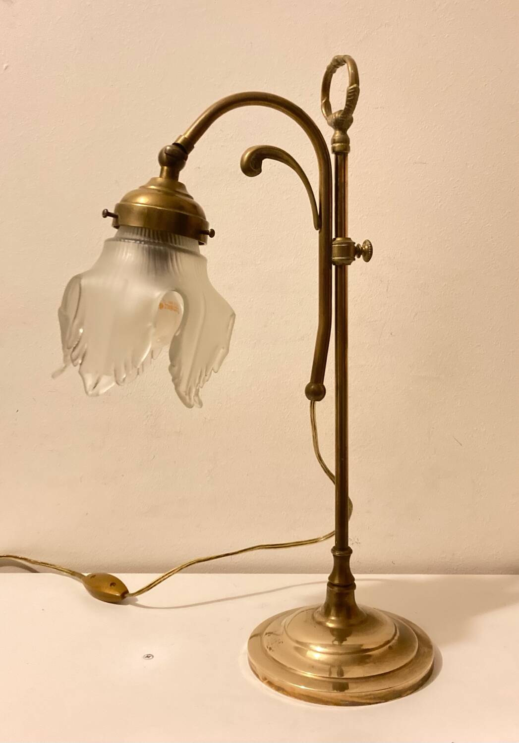 Brass table lamp with a glass shade
