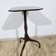 Antique octagonal mahogany side table on a classic tripod, 19th century.