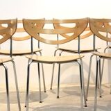 Thonet dining chairs stacked in chrome and beech