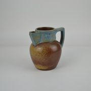 Two-tone stoneware pitcher by Louis Lourioux
