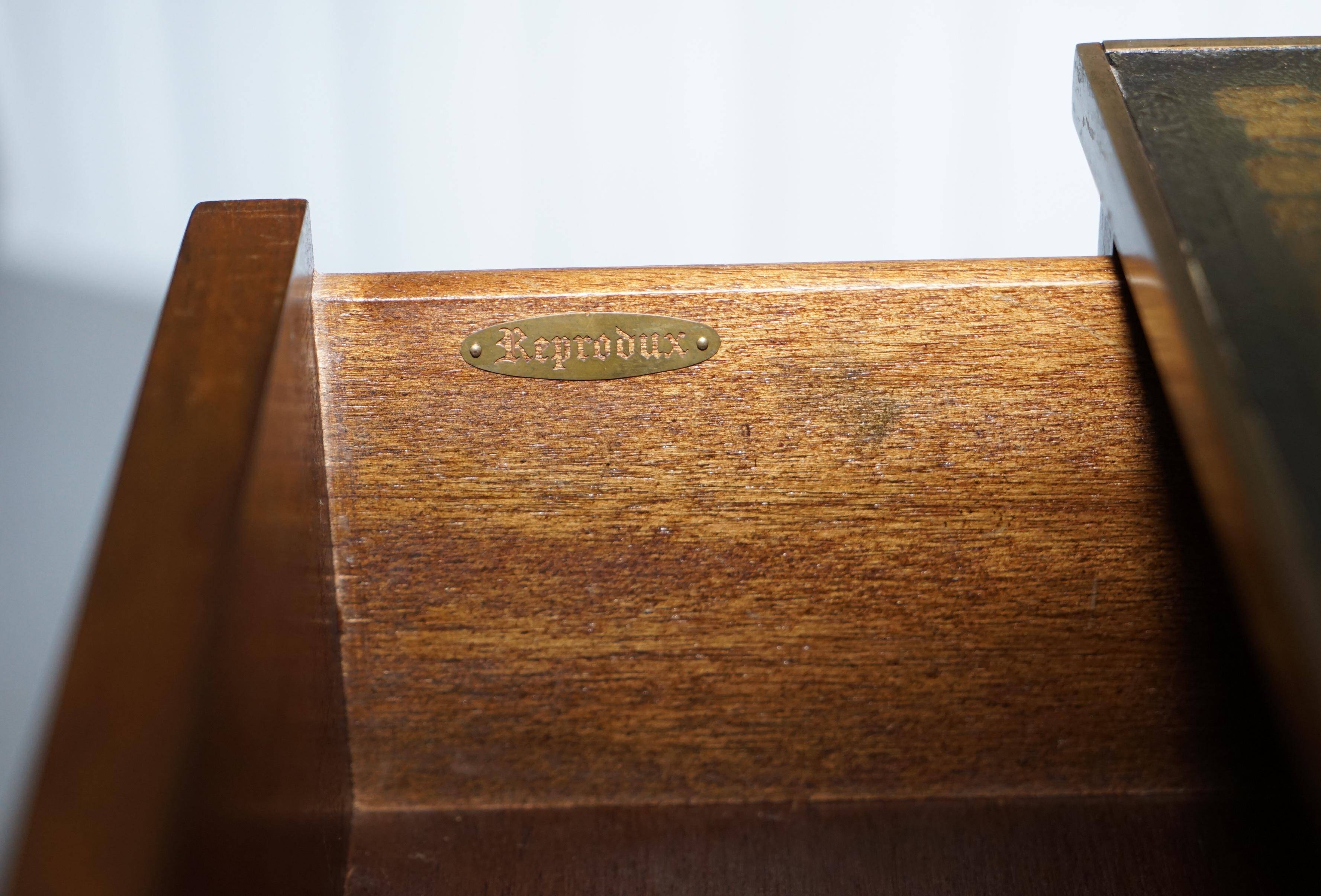Reprodux Bevan Funnell chest of drawers with a leather top