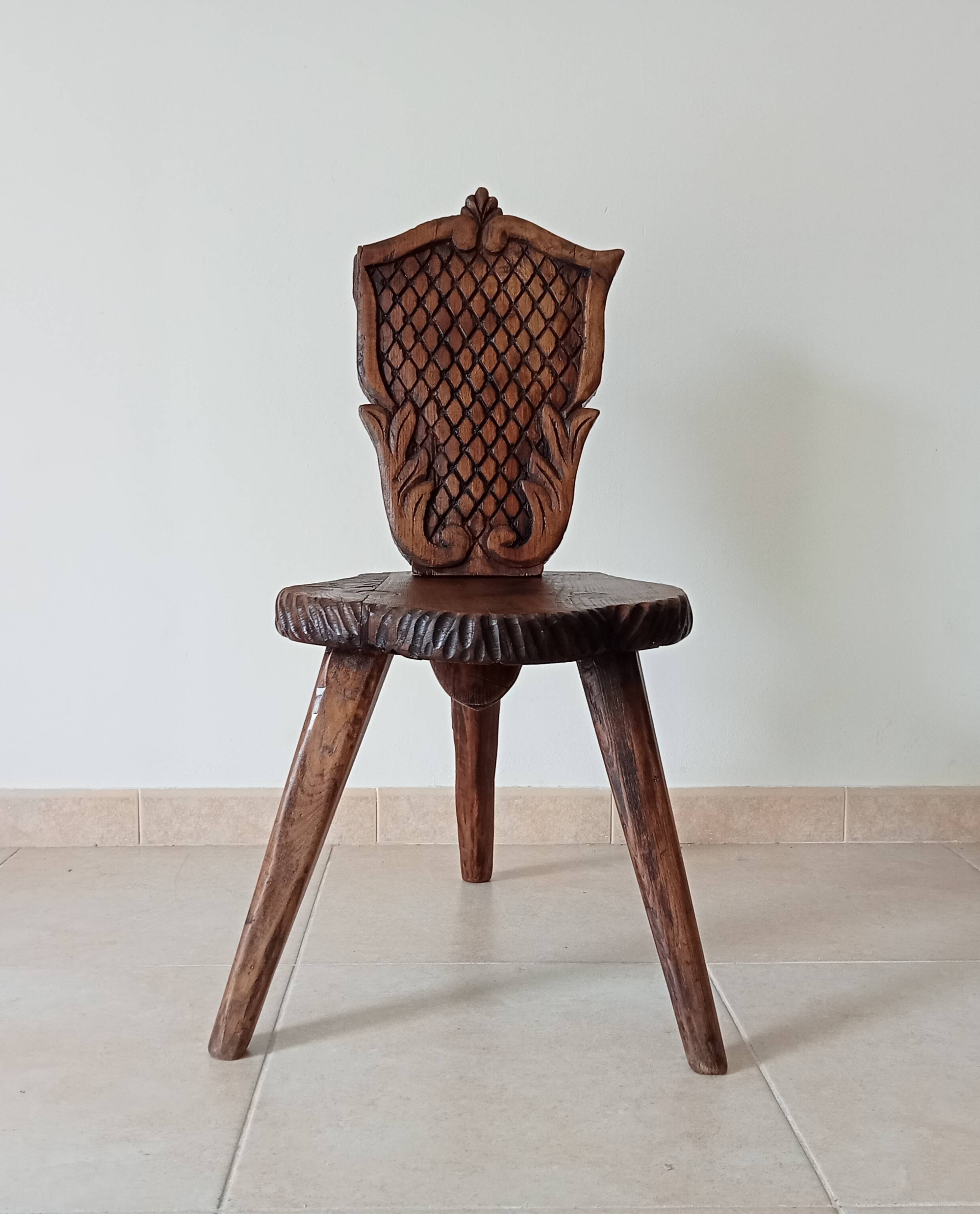 Brutalist tripod chair in carved wood 19th century
