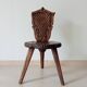 Brutalist tripod chair in carved wood 19th century