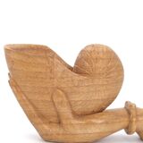 Wooden hand emptier holding a shell, 1970s