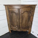 Encoignure galbée xixème en chêne