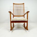 Mid-century rocking chair in pine and sheepskin by Yngve Ekström, Sweden.
