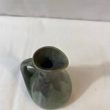 Bronze green pitcher