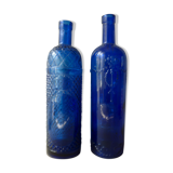 Paire de 2 bouteilles en verre bleu