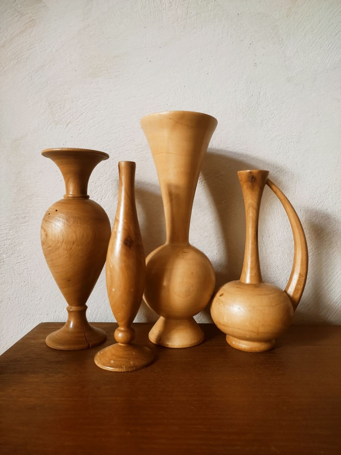 Set of 4 turned wooden vases