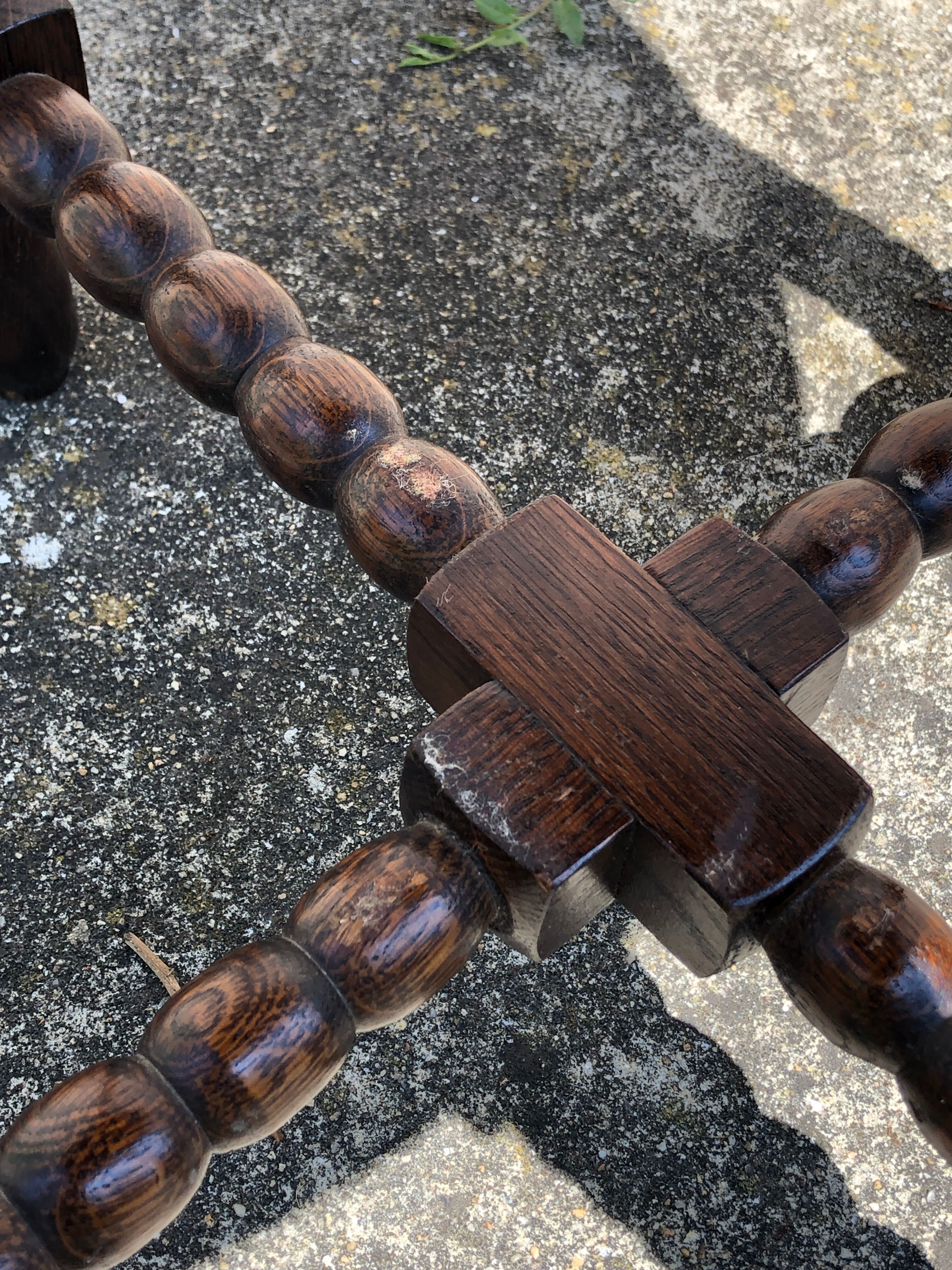 Dark turned wood side table