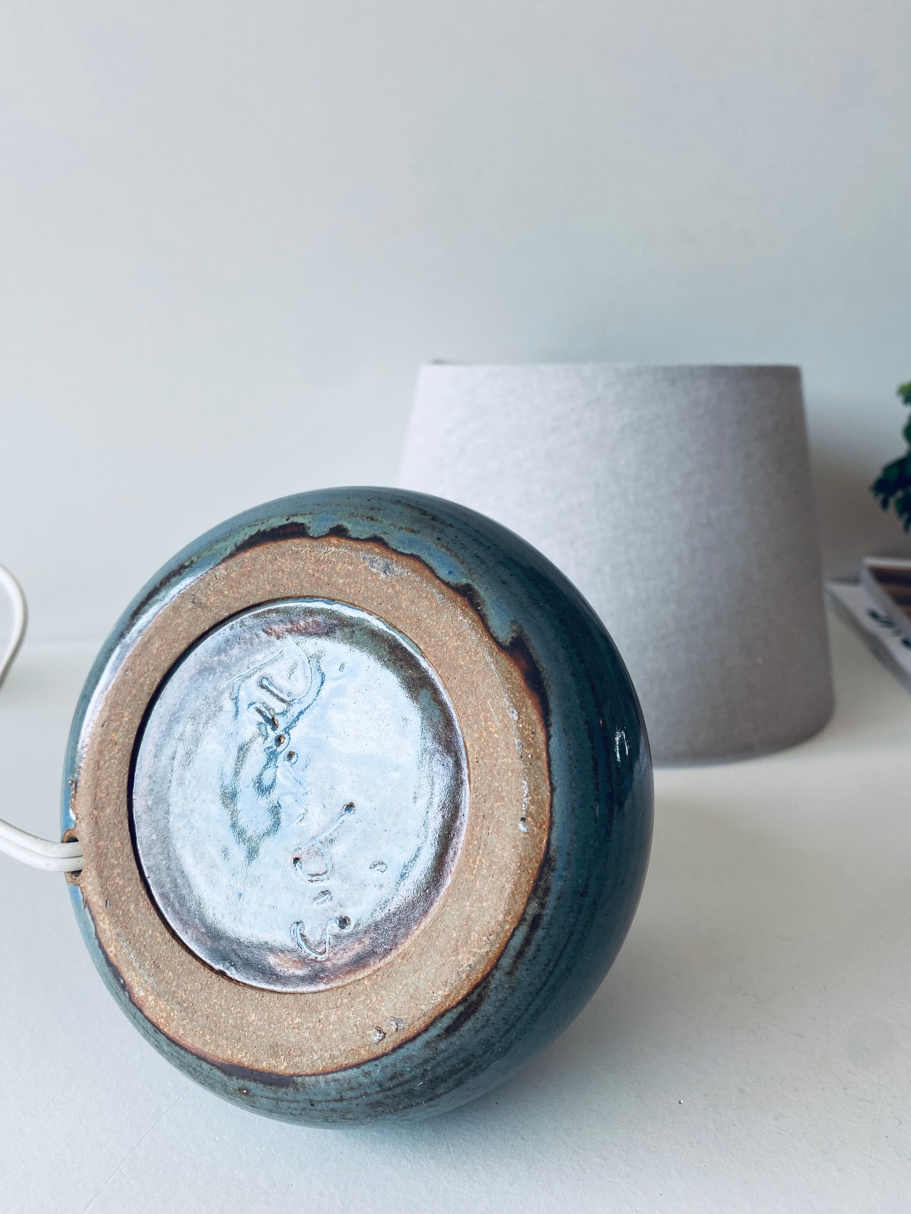 Lamp in enamelled sandstone