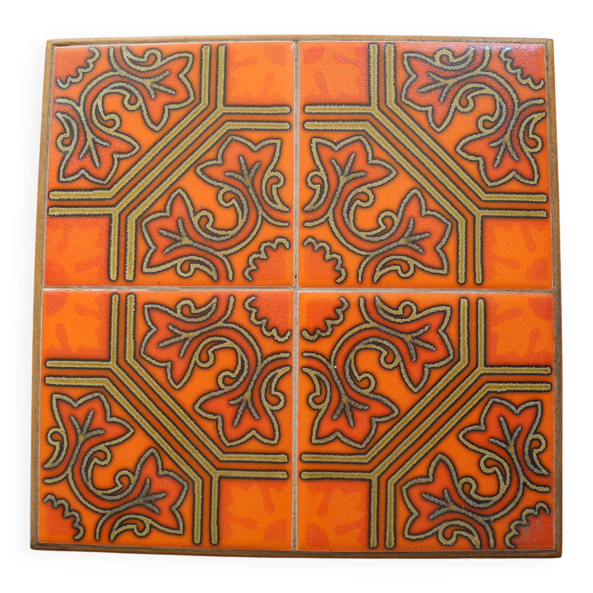 vintage orange ceramic trivet