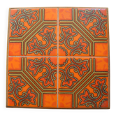 vintage orange ceramic trivet