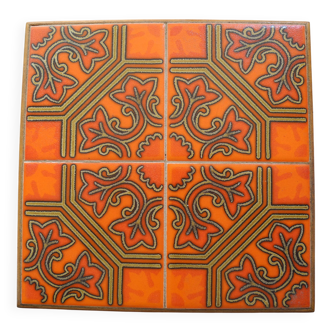 vintage orange ceramic trivet