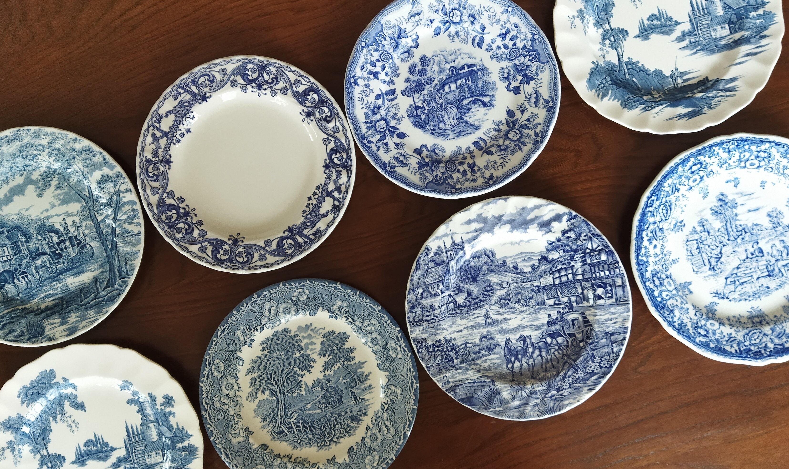 8 blue & white plates