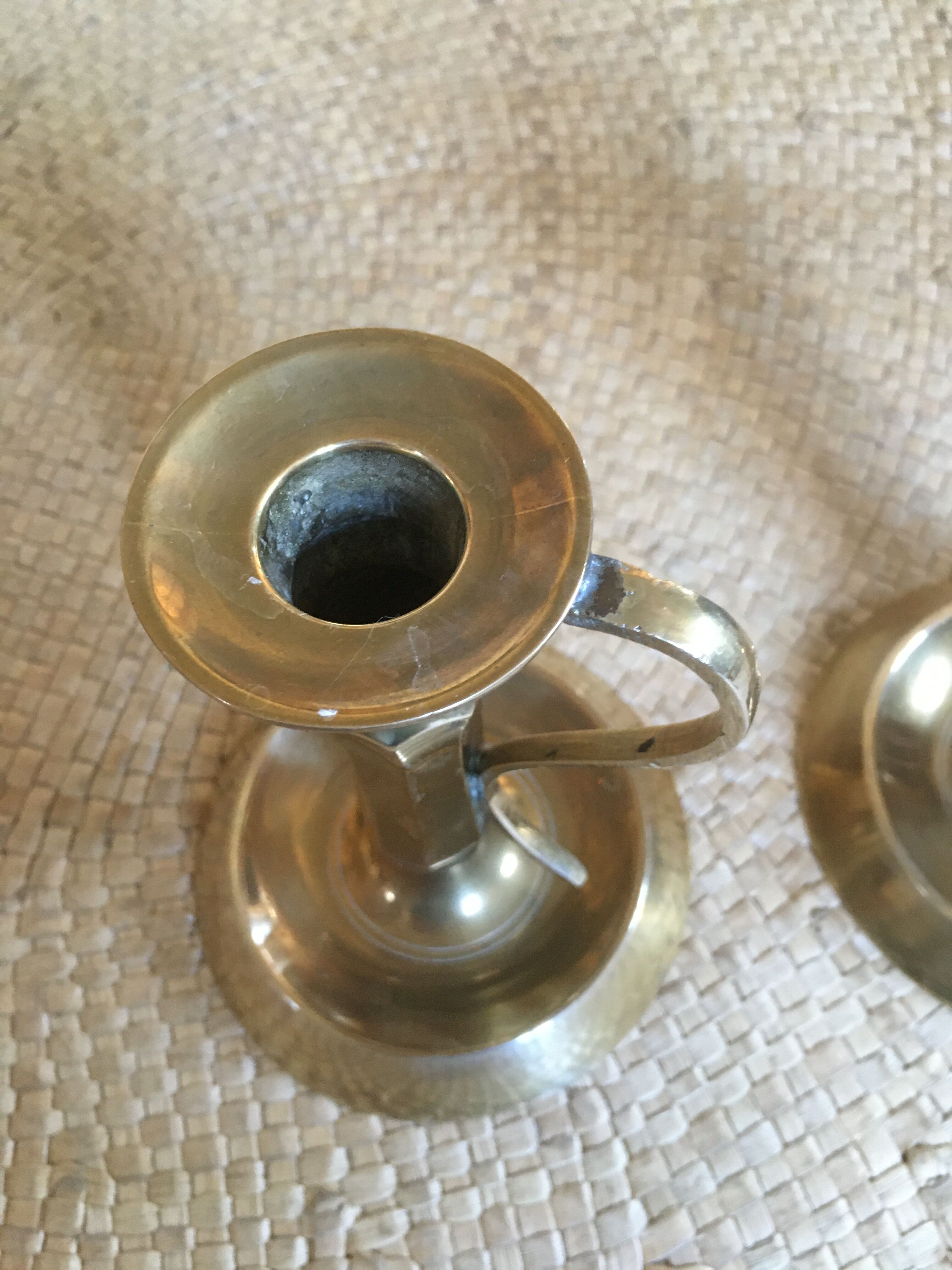 Duo of brass candlesticks