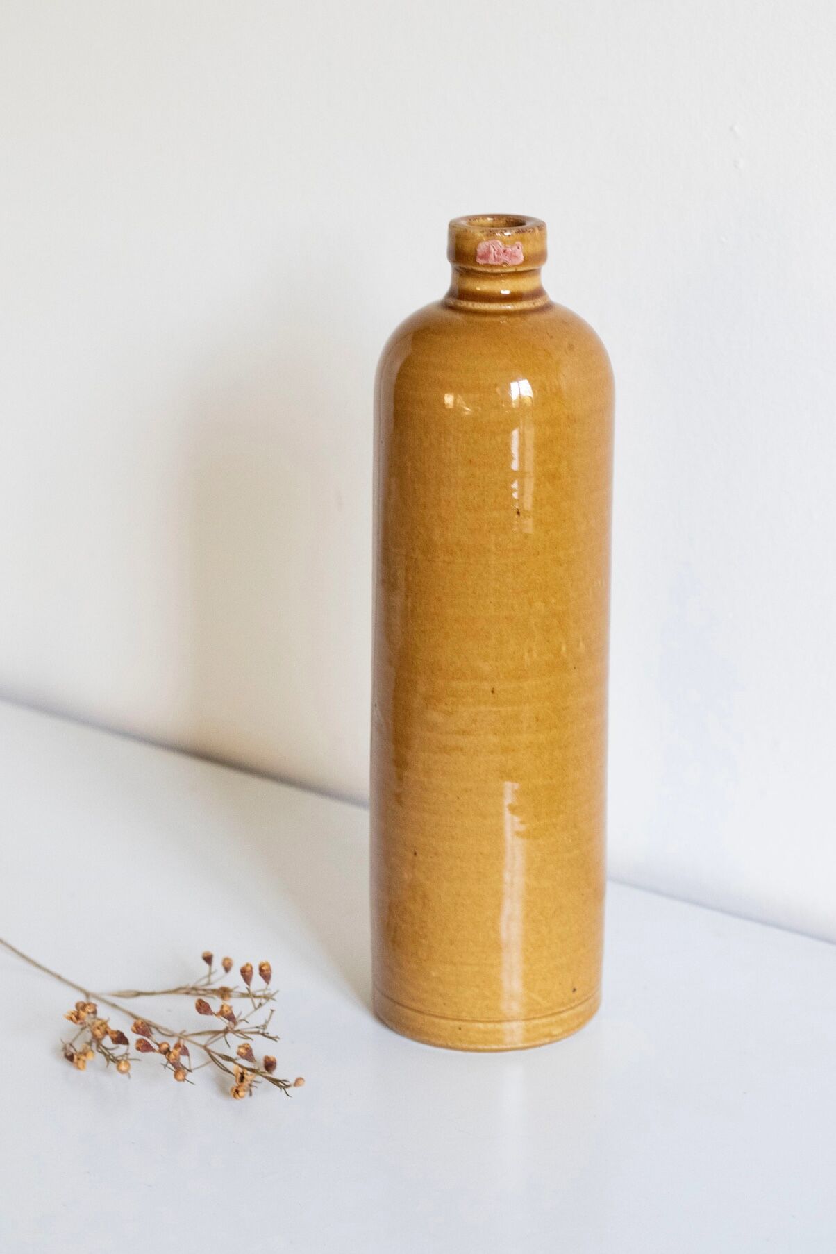 Enamelled stoneware bottle