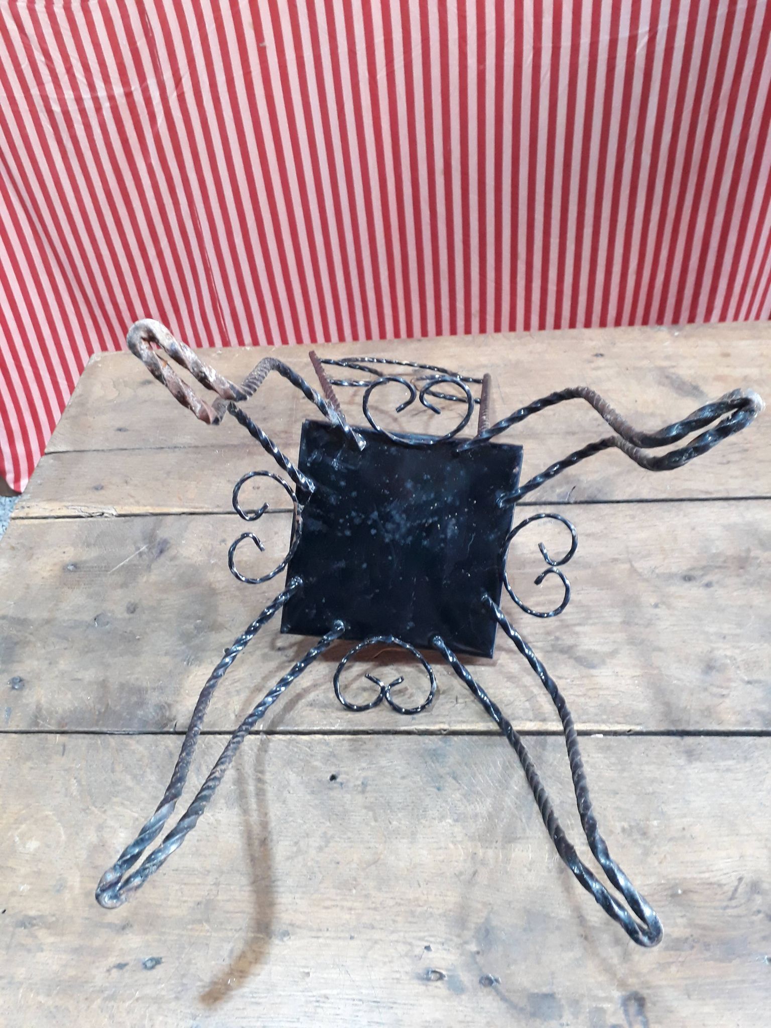 Wrought iron chair with enamelled plate signed Vallauris