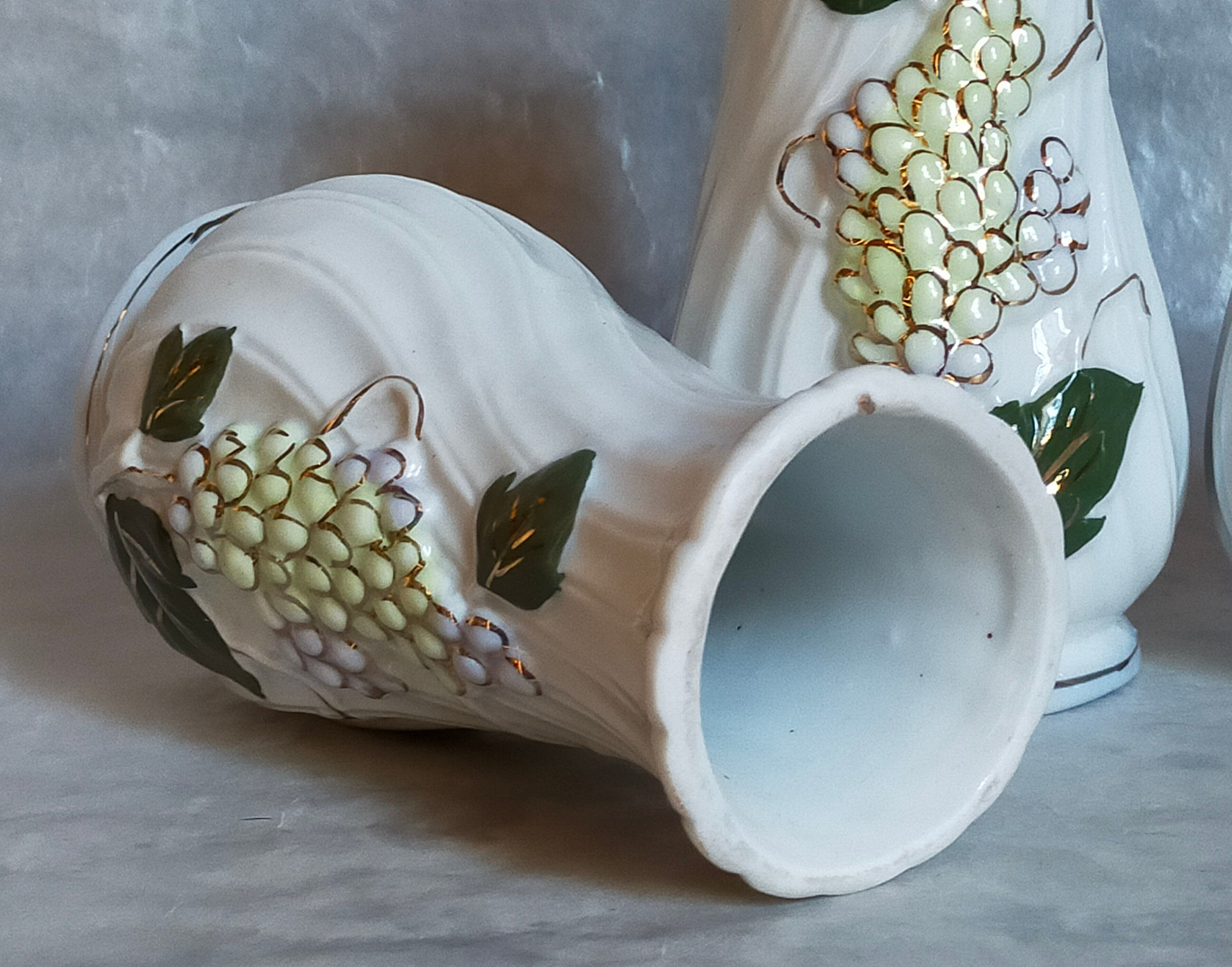 Three ancient lilac slurry vases