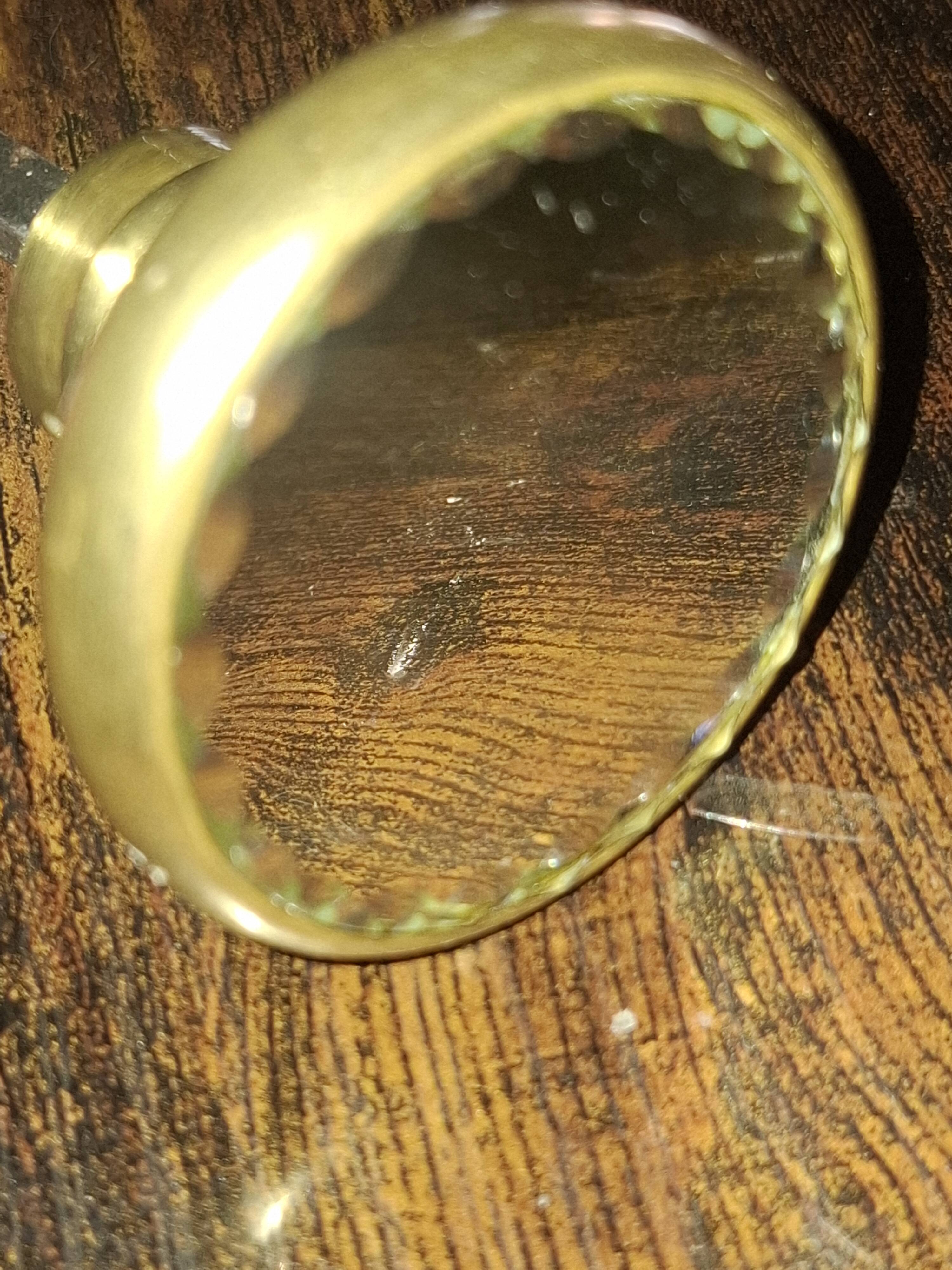 Sublime door handle made of brass with a bevelled mirror front.