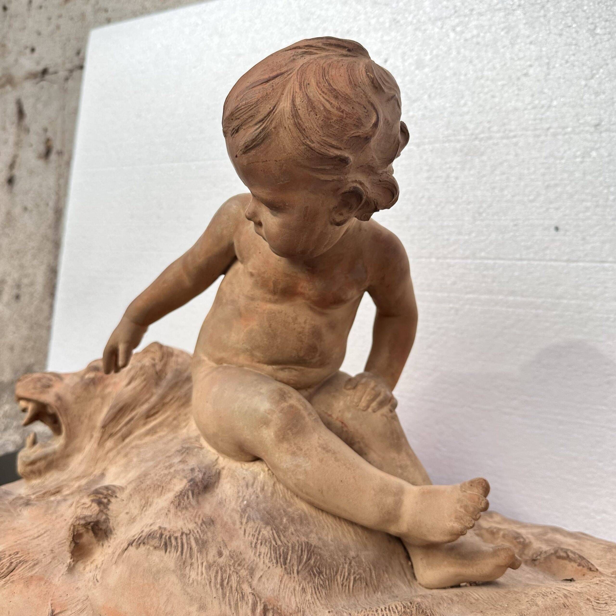 Sculpture "Putto on Lion Skin" in terracotta, Léon Dufrène, circa 1900 – France