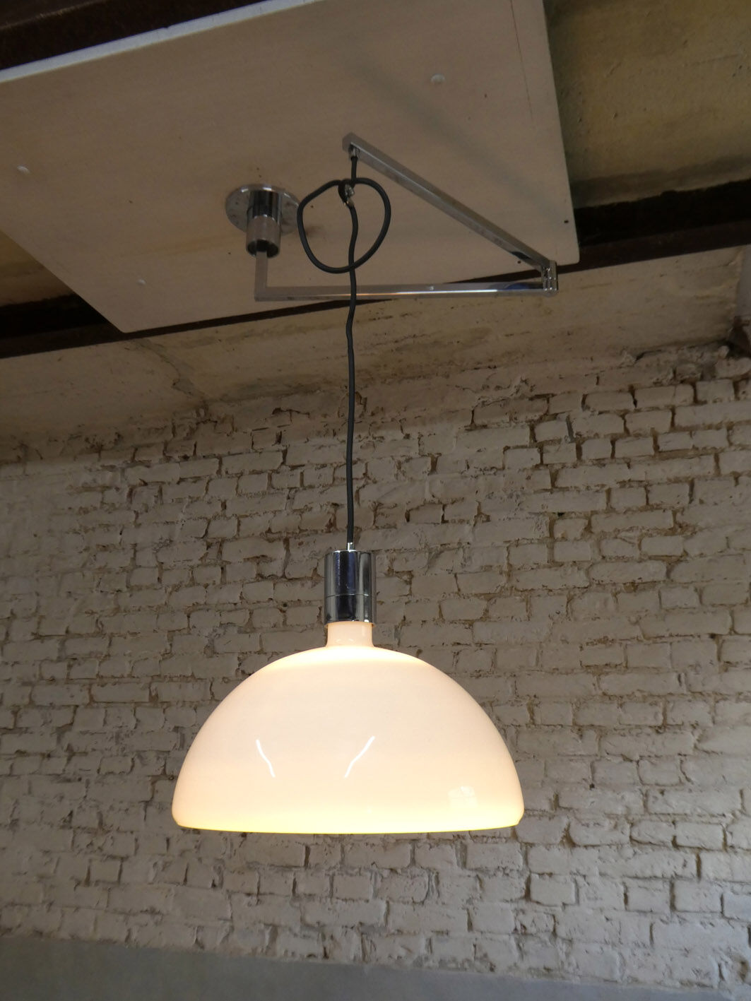 Franco Albini's articulated hanging lamp for Sirrah