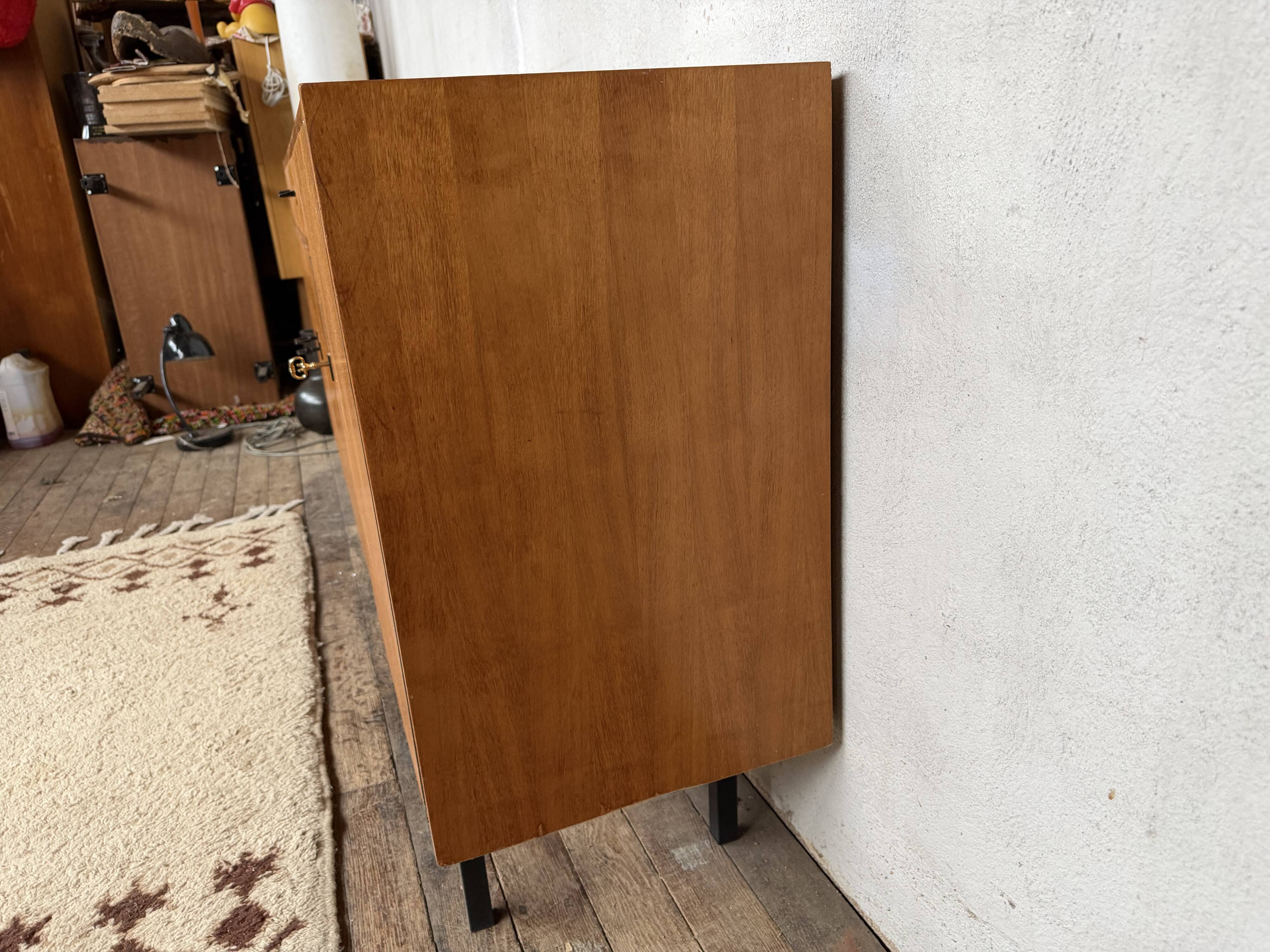 Vintage Scandinavian enfilade with metal legs.