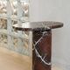 "Bold" side table in Rosso Levanto marble