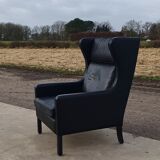 Vintage black leather scandinavian wingback chair Lulu Stouby