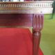 Table basse style louis XVI en acajou et laiton