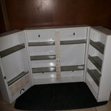 White lacquered metal medicine cabinet