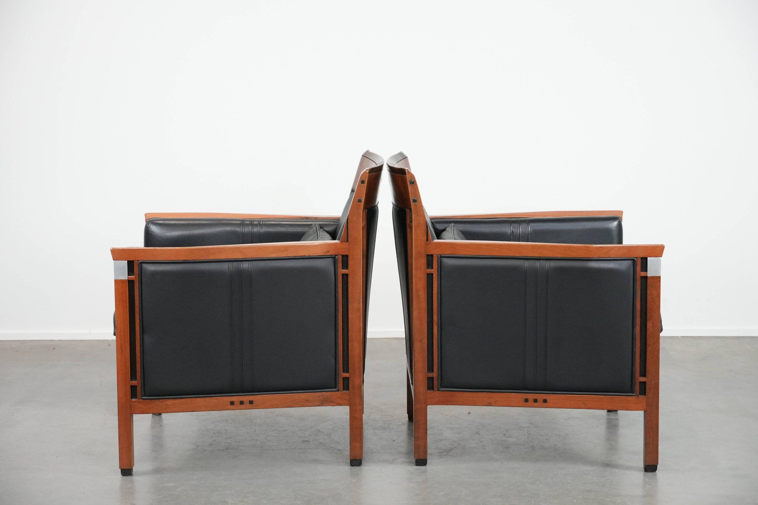 Set of  two black leather Art Deco design armchairs