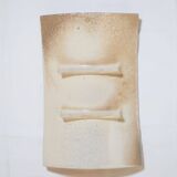 Decorative curved plate on foot