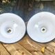 Pair of enamelled sheet metal suspensions